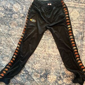 Kappa Black Track Pants with Orange Logo Tape and Embroidered Patch